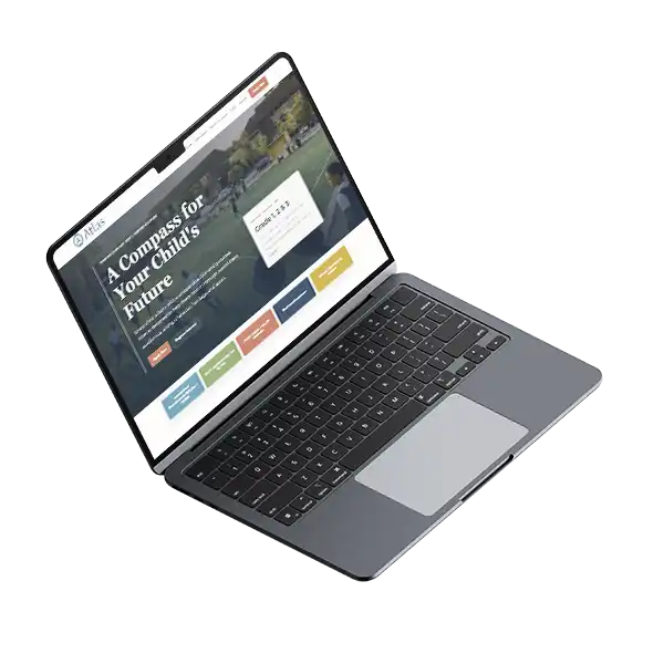Atlas school website shown on a laptop